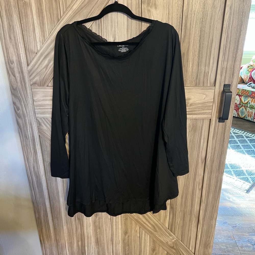 NEW w/o tags “black” swing style tunic w/ lace neckline and high-low hem